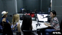 Aliya Suranova (right) leads one of the first Sisterhood discussions, which was initially launched as a radio show in June 2017 before being picked up by Kyrgyz national TV.