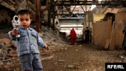 Azerbaijan -- RFE Photojournalist Abbas Atilay took this picture of a boy whose family lives in an abandoned Baku factory.