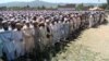 Supporters and local residents offer funeral prayers for provincial lawmaker Farid Khan, who was killed in an attack by Taliban gunmen, in Hangu in Khyber Pakhtunkhwa Province on June 4.