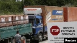 Kosovo -- Trucks with goods from Serbia are stopped and turned back at the Merdare border crossing point between Kosovo and Serbia, 22Jul2011