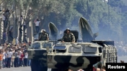 Azerbaijani military vehicles take part in a parade held in Baku in June.