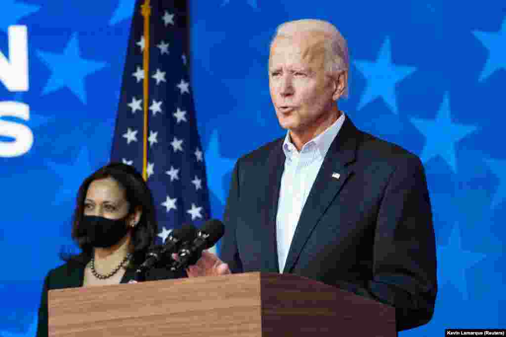 Democratic U.S. presidential nominee Joe Biden is accompanied by vice presidential nominee Kamala Harris as he makes a statement on the 2020 U.S. presidential election results during a brief appearance before reporters in Wilmington, Delaware, U.S., November 5, 2020. REUTERS/Kevin Lamarque