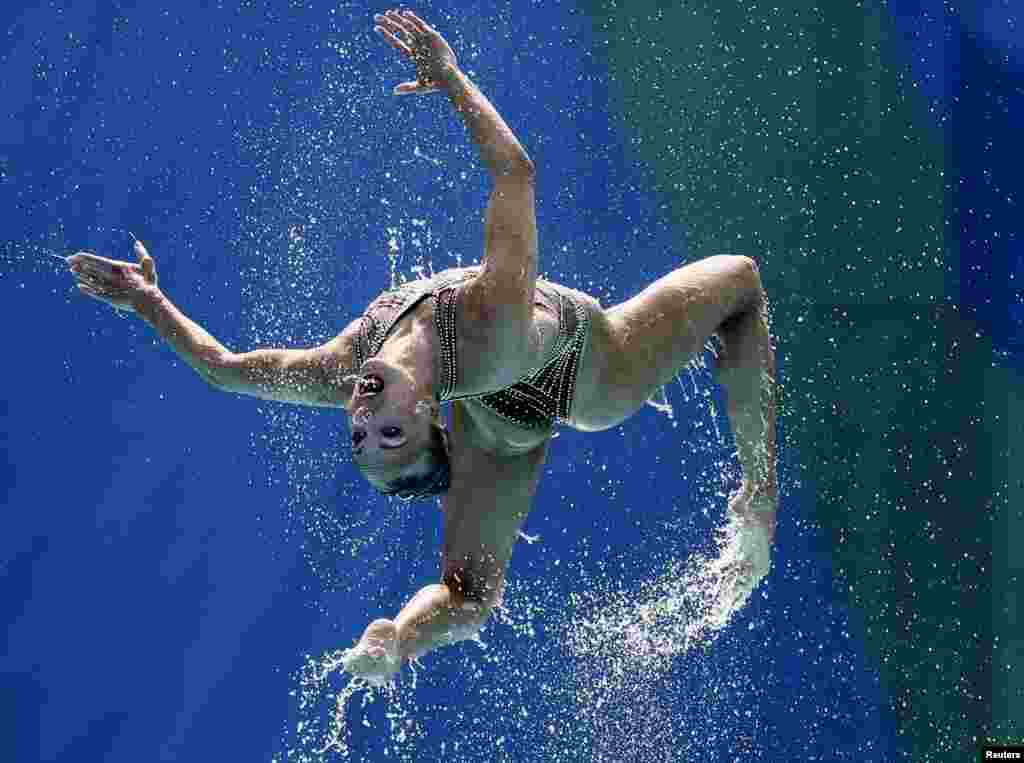 An athlete from the Russian synchronised swimming team during the technical routine final.