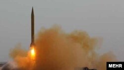 Iran fires a test missile during the second day of military exercises on June 28.