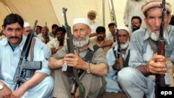 Peshawar journalist Rahimullah Yousafzai says that militias formed in the tribal areas (such as the one in Swat above) are ill-suited to fight the Taliban, and that their leaders are prime targets for extremists.