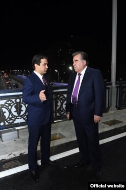 Tajik President Emomali Rahmon (right) with Rustam Emomali