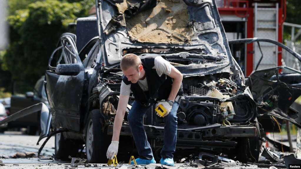 На месте взрыва машины Максима Шаповала. Киев, 27 июня 2017