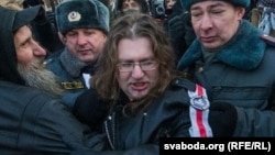 Maksim Vinyarski is detained while protesting in Moscow in December 2012.