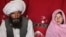 یوه یوولس کلنه نجلۍ د خپل بوډا کوژدن تر څنګ - عکس کلونه مخکې یونیسف په غور کې اخیستی 