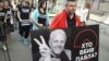 A Year After Journalist's Death In Kyiv, Demonstrators Ask 'Who Killed Pavel?'
