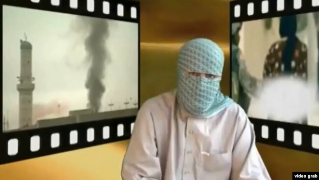 Képernyőkép egy tádzsik fegyveresről egy Afganisztánban működő militáns csoport által közzétett videóból