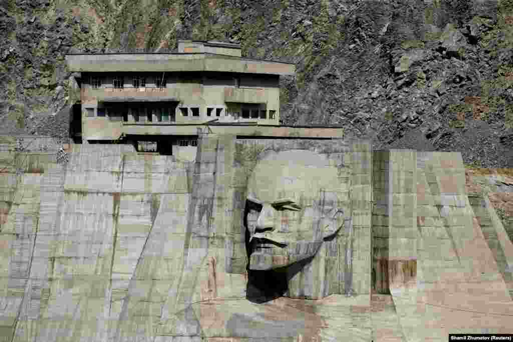 Talas, Kyrgyzstan: Lenin's glare locked in concrete on a dam on the Kirov Reservoir. 