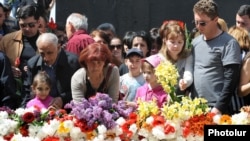 Armenians lay flowers at the Armenian Genocide Memorial in Yerevan on April 24. 