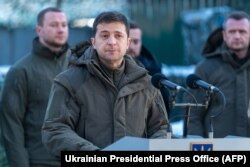 Ukrainian President Volodymyr Zelenskiy speaks during a meeting with soldiers while visiting the Donetsk region on December 6. His election campaign was filled with promises of peace.