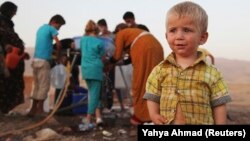 Сириялық бала Ирактағы босқындар лагерінде. 28 тамыз 2013 жыл.