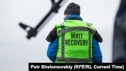 Dutch investigators inspect debris from MH17 flight near Grabovo village, East Ukraine, November 11, 2014