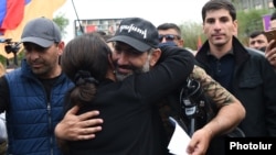 Armenia - Opposition leader Nikol Pashinian is hugged by a supporter during a rally in Yerevan, 29 April 2018.