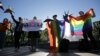 LGBT activists and their supporters hold a rally on the International Day Against Homophobia, Transphobia, and Biphobia in central St. Petersburg on May 17. (Reuters/Anton Vaganov)