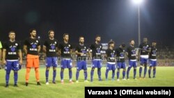 Tehran's Esteqlal football team wearing jerseys saying "The Blue Girl" before their match on September 15, 2019. 