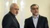 IRAN -- Iranian Foreign Minister Javad Zarif (L) stands alongside Hossein Fereidoun, President Rohani's younger brother and advisor, during a press conference for Rohani in the capital Tehran, April 3, 2015