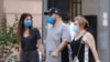 Armenia -- People wear faces masks on a street in Yerevan, August 11, 2020.