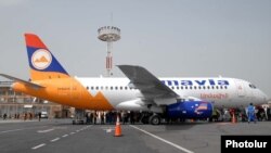 Armenia - Passengers board an Armavia airline flight at Yerevan's Zvartnots airport.