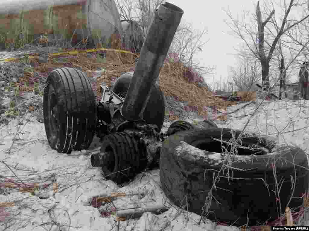 Landing gear lying in snow. Foggy weather is being cited as a possible factor in the crash.&nbsp;