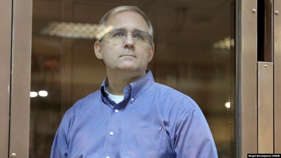 Paul Whelan looks out of the defendants' cage before a court hearing in Moscow on January 22.