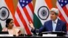 India - U.S. Secretary of State John Kerry (R) gestures as India's External Affairs Minister Sushma Swaraj looks on during their joint news conference in New Delhi, India, August 30, 2016