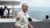 Russian President Vladimir Putin smiles before boarding a mini-submarine in the Black Sea, off the annexed Crimean peninsula.