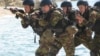 Most elite Ukrainian units (such as those pictured) have deployed alongside NATO in international peacekeeping operations but the rest are underfunded and underequipped. 