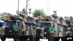 Iranian military trucks carry surface-to-air missiles during a parade on the occasion of the country's Army Day, in Tehran, April 18, 2017. File photo