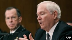 Former U.S. Defense Secretary Robert Gates speaks during a Senate Defense Subcommittee hearing in June 2011.