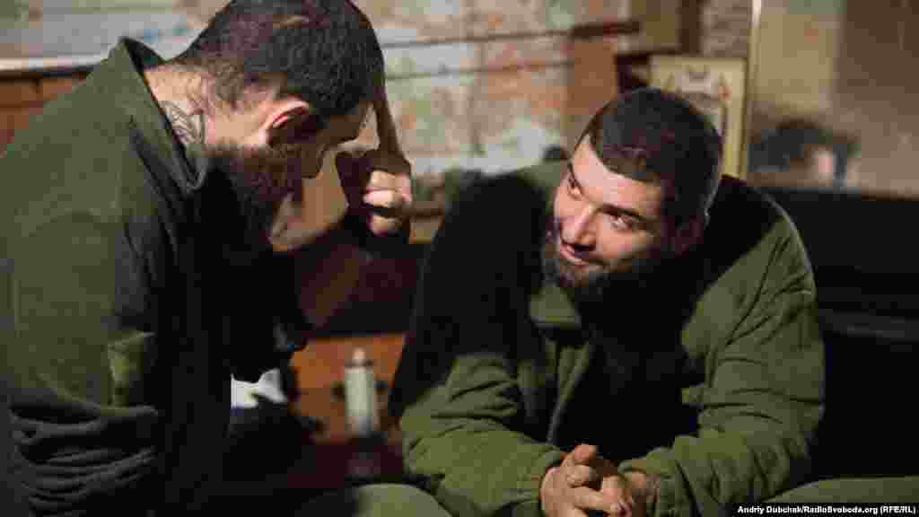 Ukrainian soldiers nicknamed Сoyote and Bek talk in an underground shelter.&nbsp;