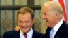 U.S. Vice President Joe Biden (right) shares a lighter moment with Polish Prime Minister Donald Tusk during their meeting in Warsaw on October 21.