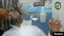 A Syrian man reported to be a victim of a chemical attack in Idlib province.