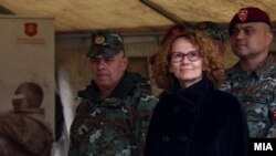 Minister of defense Radmila Shekerinska with macedonian army unit "Wolves"