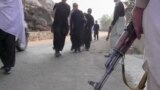 Pakistan - Peshawar - screen grab from video on teachers carrying guns to school. education schools students