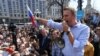 Russian opposition leader Aleksei Navalny addresses supporters during an unauthorized rally in May 2018 in Moscow.