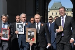 Владимир Путин и Биньямин Нетаньяху на акции "Бессмертный полк" на Красной площади в Москве. 9 мая 2018 года