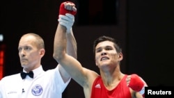 Данияр Елеусинов после победы в бою в любительском боксе на Азиатских играх.