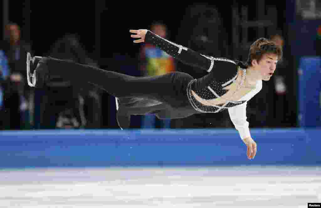 Ukraine&#39;s Yakov Hodorozha competes during the figure skating men&#39;s short program.