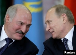 Александр Лукашенко и Владимир Путин в Москве после заседания Совета ЕврАзЭС. 23 декабря 2014 года