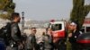 ISRAEL--Israeli security forces work at the scene of a truck ramming incident in Jerusalem January 8, . REUTERS