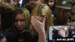 Czech model Tereza Hluskova weeps after the court decision to sentence her to eight years and eight months in prison for attempted heroin smuggling in Lahore on March 20.