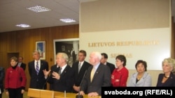 U.S. senators John McCain (center right) and Joseph Lieberman (center left) meeting Belarusian students in Vilnius