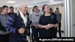 Вице-премьер Крыма Юлия Жукова открыла фотовыставку в Симферополе к шестой годовщине российской аннексии полуострова, 17 марта 2020 года