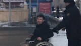 Kazakhstan - Disabled activist Asanali Suiubayev is taken by police. Aktobe, 22 February 2020