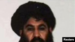 Mullah Akthar Mansur is seen in this undated handout photograph by the Taliban