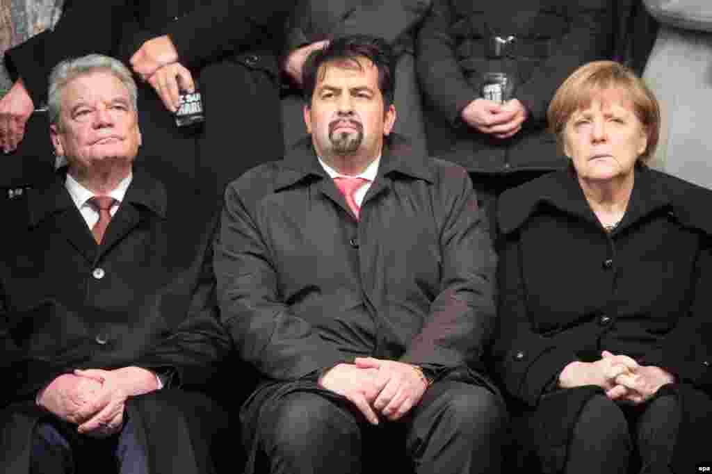 Nemački predsednik Joakim Gauk, predsedavajući Saveta nemačkih muslimana Aiman Mazjek i kancelarka Angela Merkel